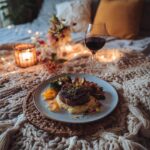 at home romantic dinner setup on floor